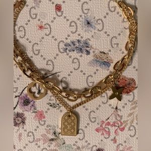 18k gold plated Designer inspired style double strand charm bracelet.